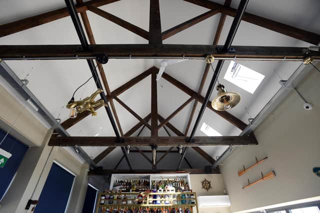 A lowered ceiling was removed to reveal the original Victorian beams