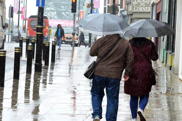 Rain falls on Fawcett Street, Sunderland.