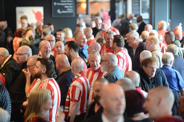 Red and white shirts galore as fans get into the spirit of the occasion.