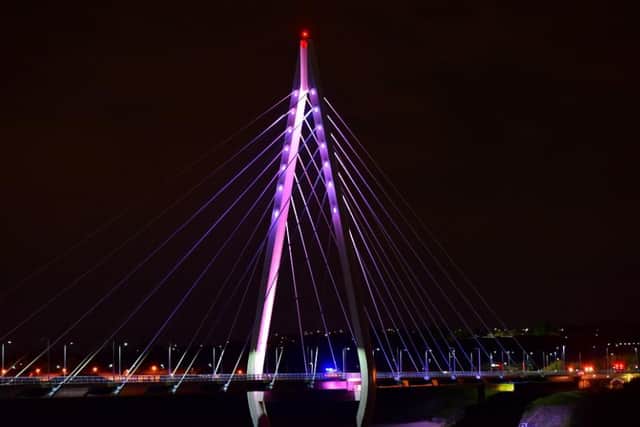 The Northern Spire Bridge will also be lit purple.
