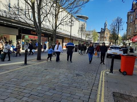 St Sepulchre Gate was bustling.