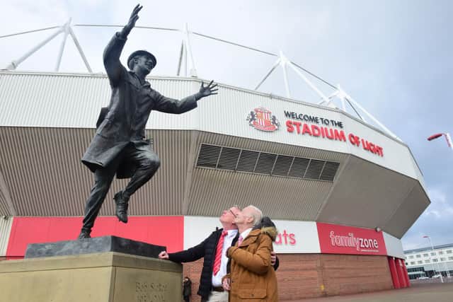 Fred Hicks, 94, with his son Glenn at the Bob Stokoe statue at the Stadium of Light, where Fred remembered watching every game in Sunderland's 1973 Cup run.