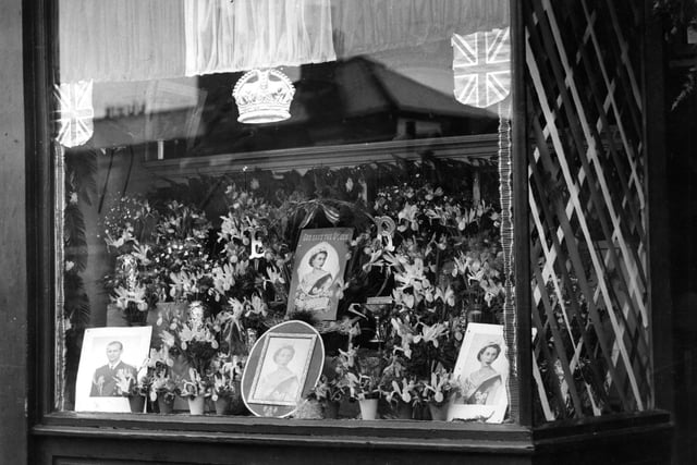 Crosby's decorated shop was chosen as best decorated in the East End during the Coronation celebrations.