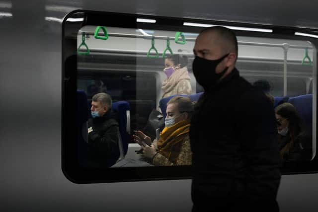 The reintroduction of mandatory face masks in certain public settings is part of the Government's Winter Plan B.

Photo by NATALIA KOLESNIKOVA