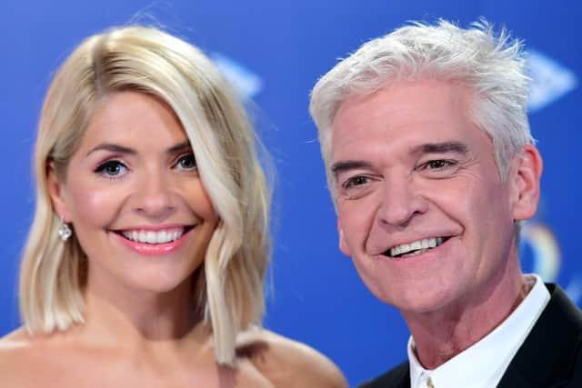 File photo dated 09/12/19 of Holly Willoughby (left) and Phillip Schofield, will return to This Morning on September 1, ITV has confirmed. The duo have been away for the summer holidays, with Eamonn Holmes and Ruth Langsford filling in for them. See PA Feature SHOWBIZ TV Quickfire Schofield.. Picture credit should read: Ian West/PA Wire/PA Images. WARNING: This picture must only be used to accompany PA Feature SHOWBIZ TV Quickfire Schofield.