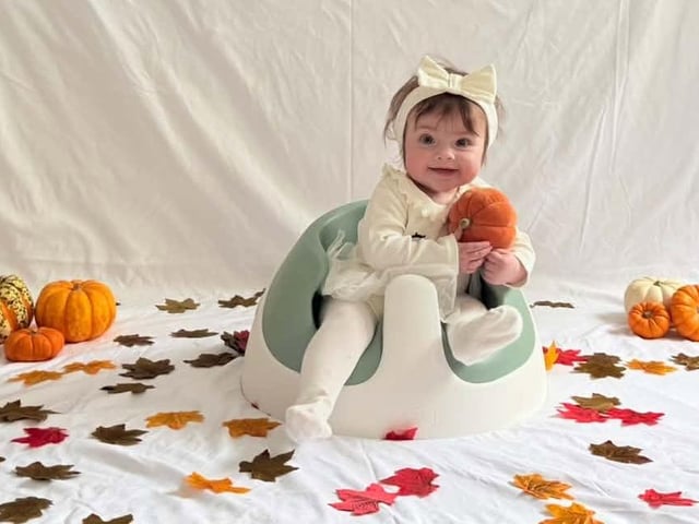 Stephanie Ellwood dresses as a not-so-spooky ghost.