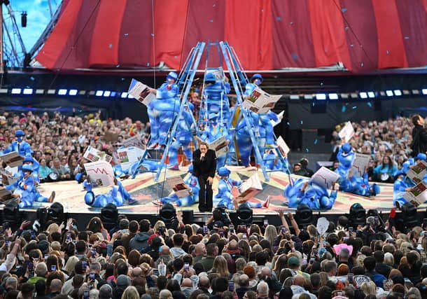 It is 15 years since Take That last performed in the city. Mark Owen takes centre stage.