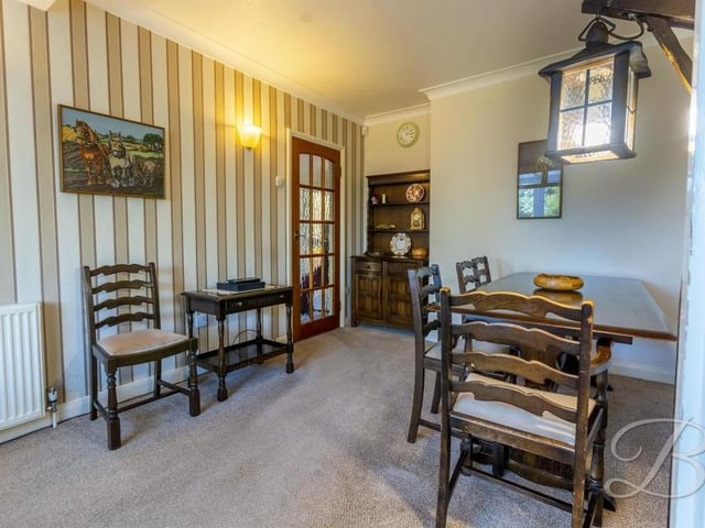 Meal times are nothing but a pleasure in the dining room, which sits next to the kitchen and also has a window looking into the conservatory.