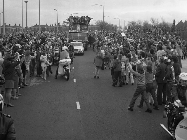 Durham Road on the way past Thorney Close. Fans were desperate to get as close as they could to the bus.