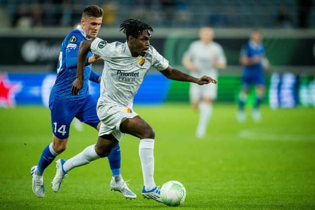 Djurgardens' Swedish forward Joel Asoro (R) fights for the ball with Gent's Belgian defender Alessio Castro-Montes during the UEFA Europa Conference League group F football match between Gent and Djurgardens at KAA Gent Stadium in Gent.