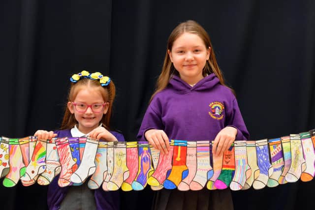 Children at New Penshaw Academy wore odd socks in recognition of World Down Syndrome Day.