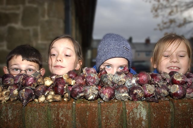 Pupils from Wessington Primary School helped to plant bulbs around Washington Village in 2004. Here are Christopher Harris, Alana Witherspoon, David Stewart and Laura Graham from Year 4.