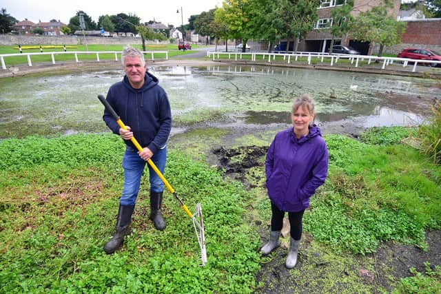 Gary Johnston, 52, and Belinda Gibbs, 53, are appealing for help from the council and local community to restore Whitburn pond to its former state. 

Picture by FRANK REID