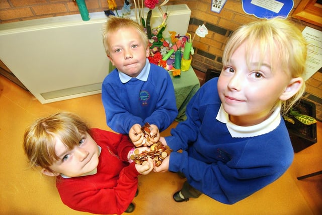 Grace Cavert, Keiron Husband and Emily Krohn were getting ready to lay a line of pennies around Newbottle Primary School in 2007.
