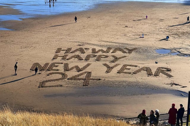 The Roker sand artist crafted a new year message.