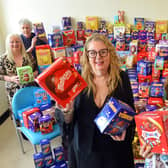 Viv Watts of Hope 4 Kidz, with healthcare assistant Helen Hudson and hospital staff get ready to share out the Easter Eggs at Sunderland Royal Hospital.