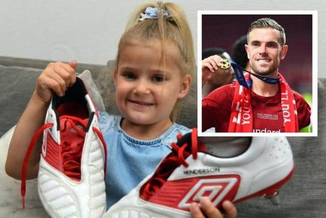 Liverpool footballer Jordan Henderson donated boots for an auction that helped to raise funds for a new wheelchair for little Rubie O'Brien from Southwick.