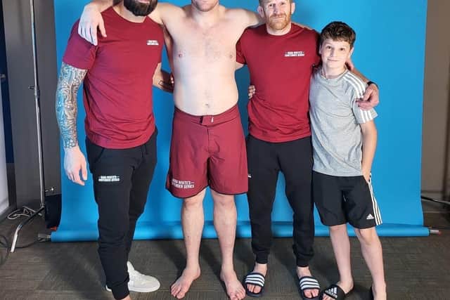 Mick and coach Andrew Fisher, centre right, with UFC fighter Paul Craig and Andrew's son Nate Noah Fisher
