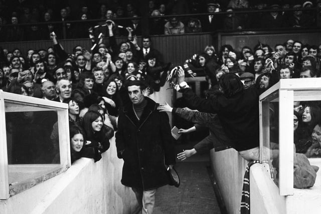 Sunderland manager Bob Stokoe walks out of the tunnel to thousands of adoring fans.
