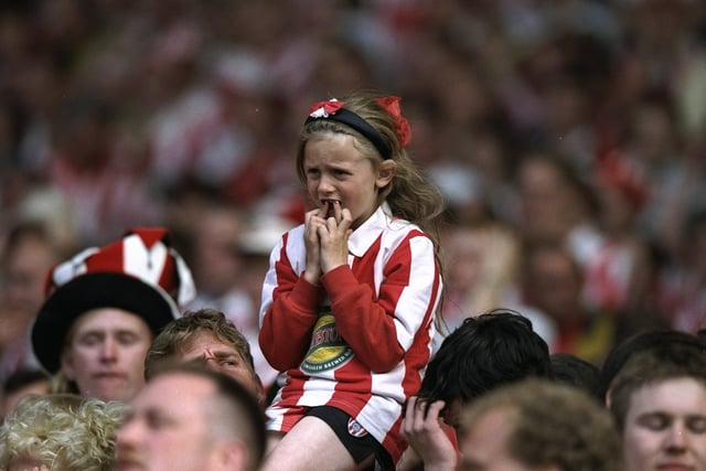 A young Sunderland fan watches the Division One play-off final against Charlton Athletic at Wembley Stadium in London. The match ended in a 4-4 draw after extra time and Charlton Athletic went on to win 7-6 on penalties in 1997.