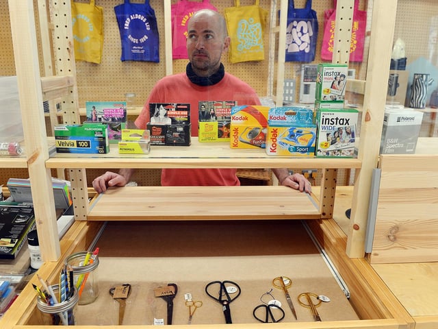 Mark Aldous inside the shop.