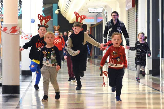 Parents and children taking part in the Bridges Charity Reindeer Dash.