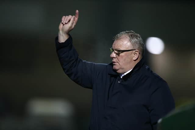 Gillingham manager Steve Evans gives instructions during the Sky Bet League One match between Northampton Town and Gillingham at PTS Academy Stadium.