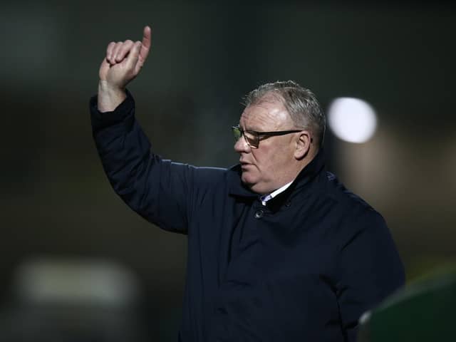 Gillingham manager Steve Evans gives instructions during the Sky Bet League One match between Northampton Town and Gillingham at PTS Academy Stadium.