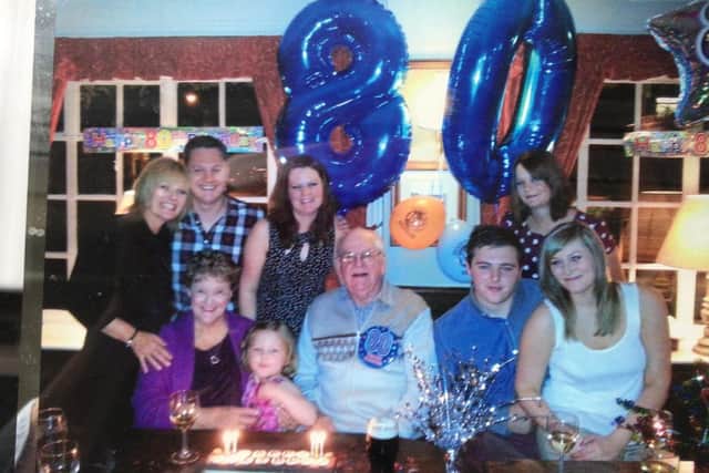 Family pictured at Ted's 80th birthday