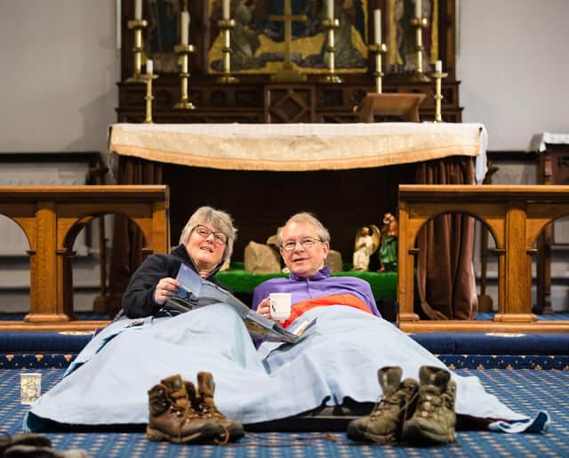 Bishop Paul and Rosemary wake from their night sleeping in St Mary Magdalene Church in Trimdon, enjoying a cup of tea.