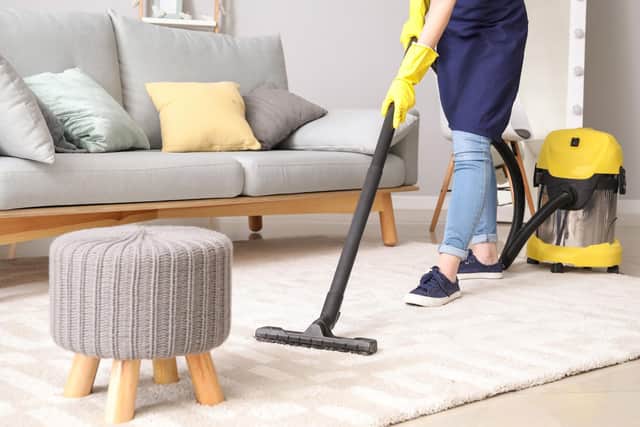 It is important to vacuum around your home to remove dust frequently (photo: Adobe)
