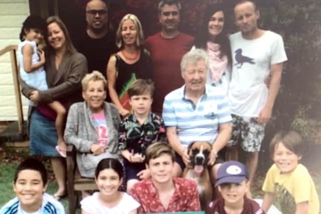 The Hills family in Australia, including children and grandchildren. Christine is pictured left in the middle row.