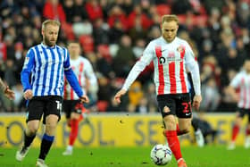 Sheffield Wednesday's Barry Bannan and Sunderland's Alex Pritchard. Picture by FRANK REID