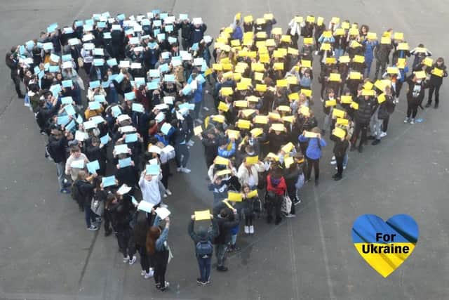 Pupils at Monkwearmouth Academy created a giant broken heart in the colours of Ukraine to show their support for people fleeing the war-torn country.