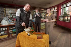 Rosie Nichols, Keeper of Social History at Beamish Museum joins her colleagues Carl McSorley (left) and Matthew Henderson at the Edwardian Chemist and Dispensary ahead of the University of Sunderland's Pharmacy Centenary celebration virtual tour event.