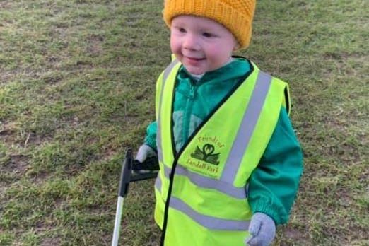 Sandall Park has had volunteers helping to pick up litter left - here is a very young one!