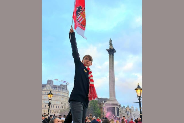 Jackson Braley, 11 flying a Sunderland flag in London.