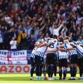 The Sheffield Wednesday squad huddle prior to the Sky Bet League One match between Charlton Athletic and Sheffield Wednesday at The Valley.