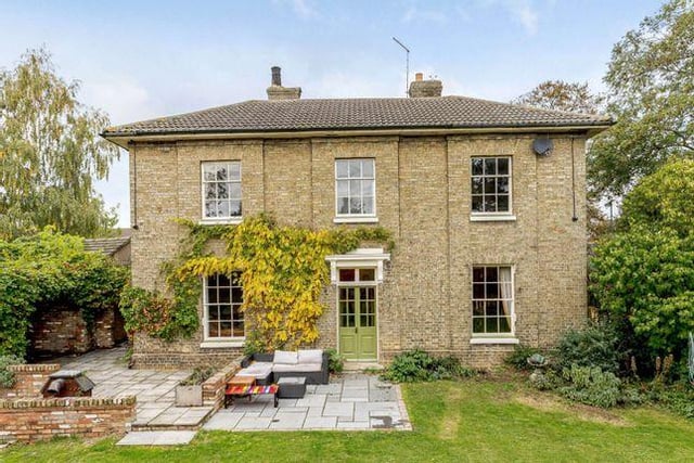 A former Grade II Listed Rectory, this property provides five bedrooms, four of which are double and one of which is a single, and features elegant period details and stylish decor throughout. There is also a fully enclosed rear garden. Guide price £700,000.