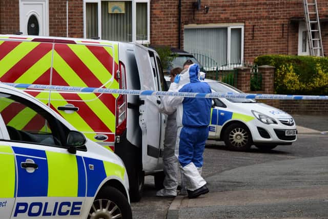 Police at the scene on Aintree Road in Sunderland, where the body of a 48-year-old man was found inside a property yesterday, leading to four people being arrested on suspicion of murder.