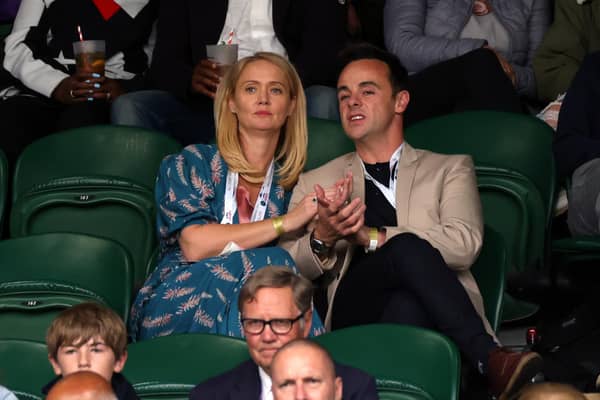 Anne-Marie Corbett and Ant McPartlin (right) watch the Wimbledon Ladies' singles quarter-final match at The All England Lawn Tennis and Croquet Club, Wimbledon.