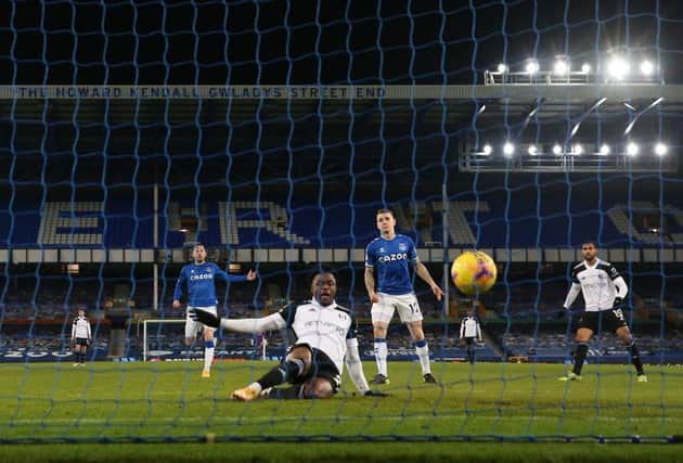 Josh Maja of Fulham scores their side's first goal during the Premier League match between Everton and Fulham.