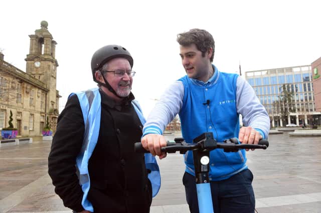 Zwings COO Stephen Bee giving instructions to Sunderland Echo reporter Kevin Clark ahead of his test ride