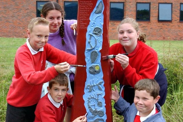 Pupils from Hylton Red House Primary School painted a mile post for the National Cycle Network in 2003, but who are the students in the picture?
