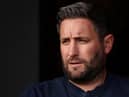 BURSLEM, ENGLAND - AUGUST 10: Lee Johnson, Head Coach of Sunderland looks on prior to the Carabao Cup First Round match between Port Vale and Sunderland at Vale Park on August 10, 2021 in Burslem, England. (Photo by Lewis Storey/Getty Images)