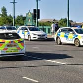 A number of police officers and vehicles attended the scene.