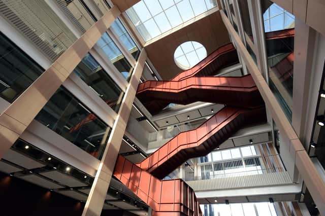 The central steel staircase inspired by the city's industrial heritage