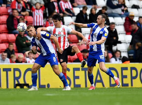 Luke O'Nien and Max Power battle it out at the Stadium of Light