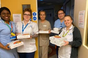 Key workers and NHS staff have been enjoying free pizza
