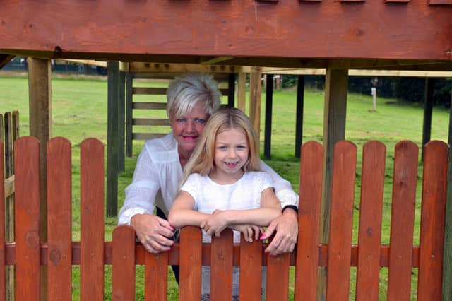 Angie Crosbie. with granddaughter Patience Crosbie, eight, decided to donate her birthday and raise extra cash to help the Ribbon School complete its new play area project.